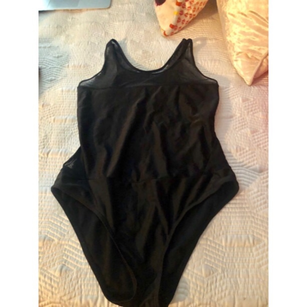 One piece swimsuit.